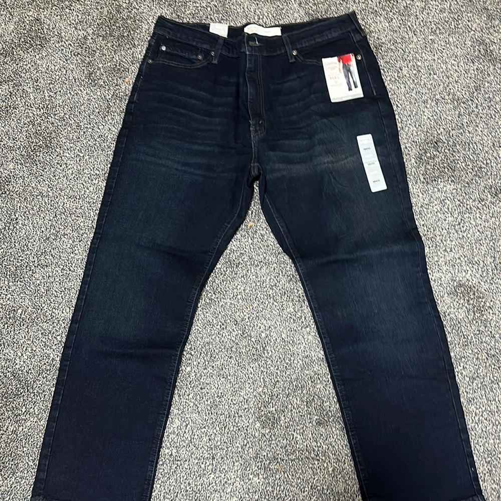 Size 38X30 men’s Levi Athletic jeans. New with tags.